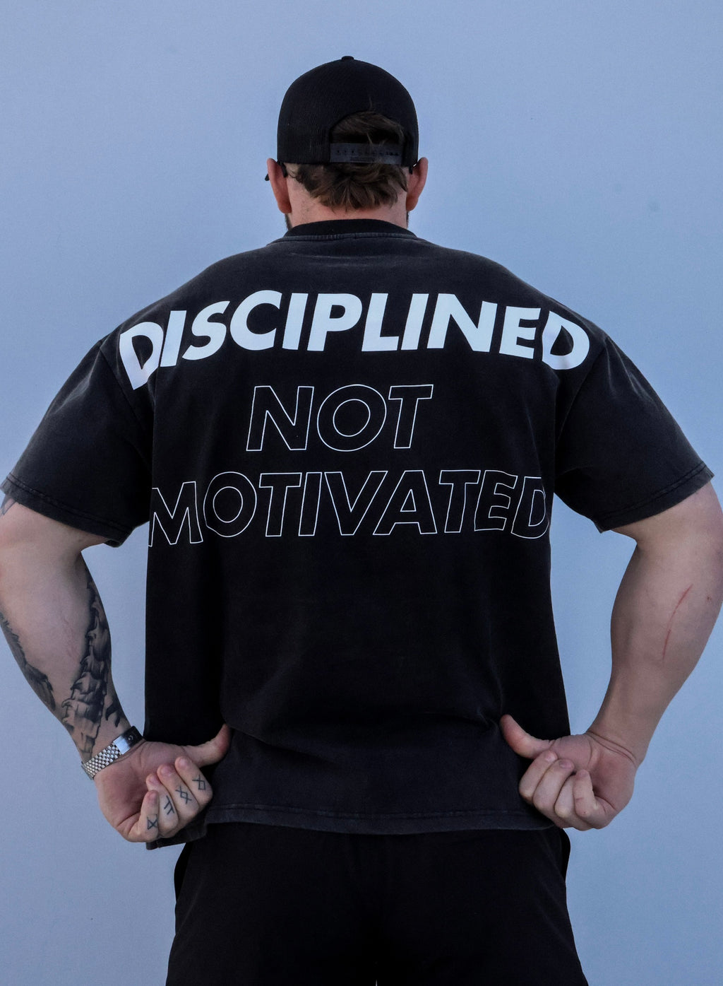 DISCIPLINED NOT MOTIVATED LEGACY TEE
