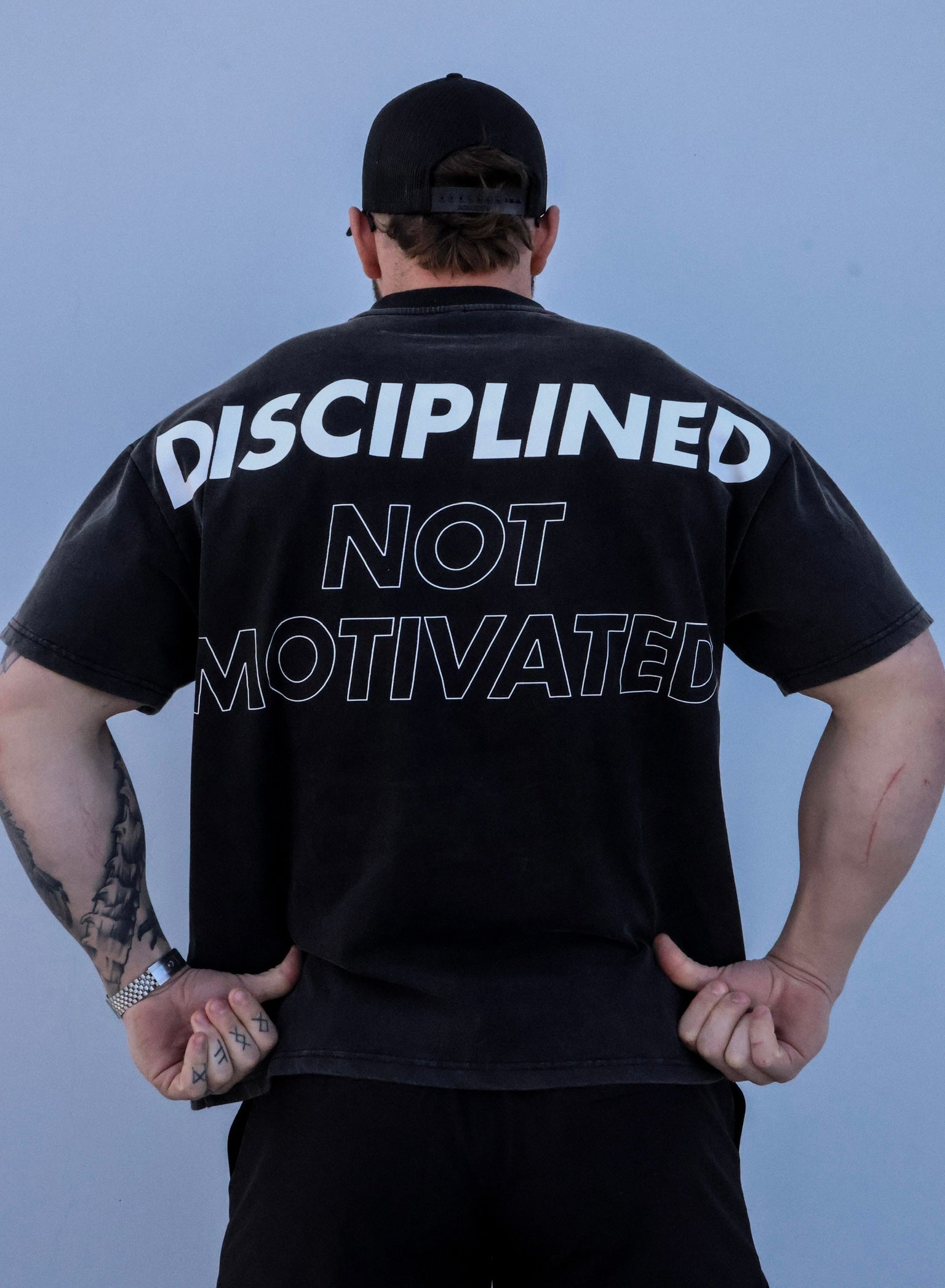 DISCIPLINED NOT MOTIVATED LEGACY TEE