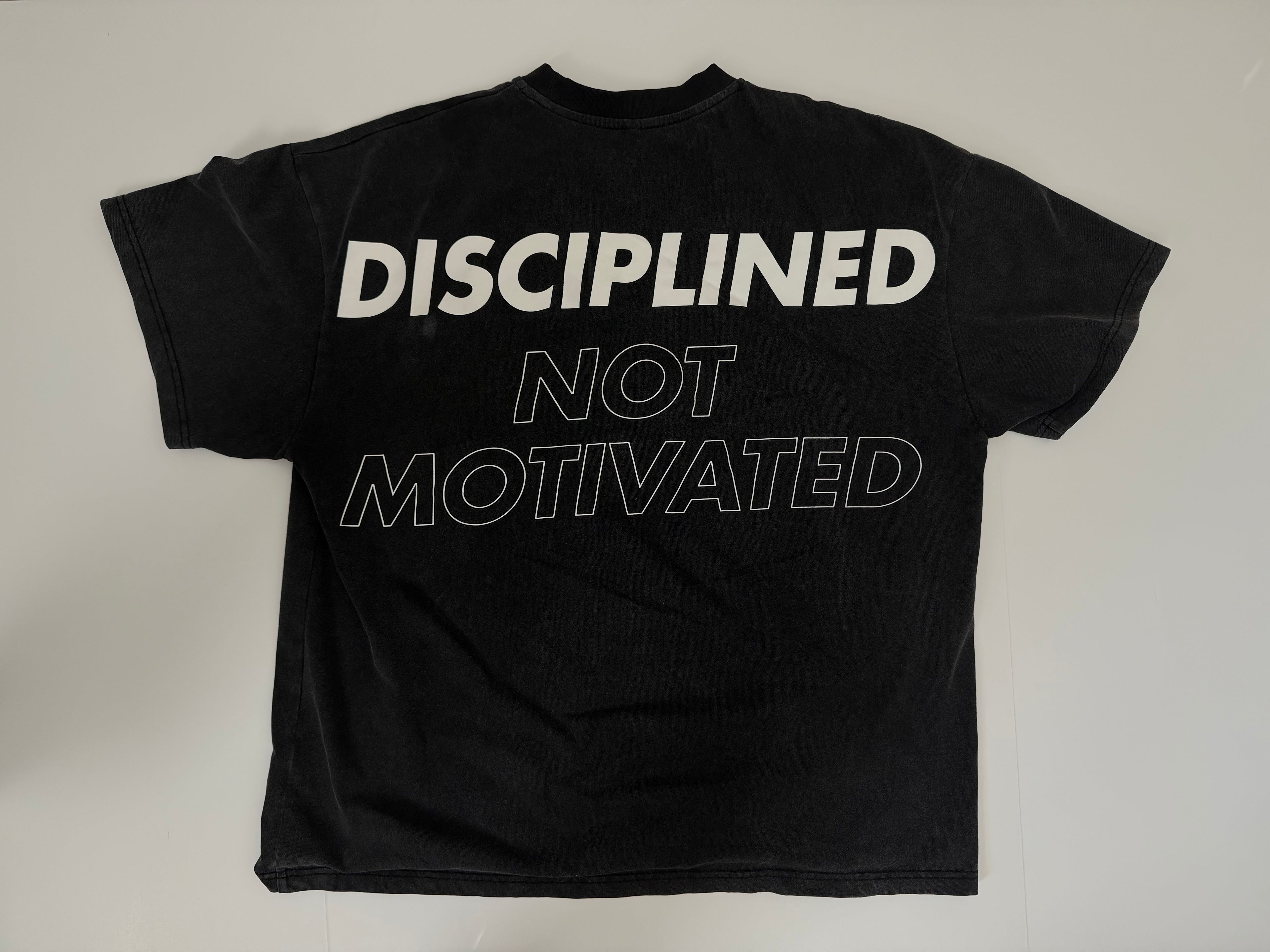 DISCIPLINED NOT MOTIVATED LEGACY TEE